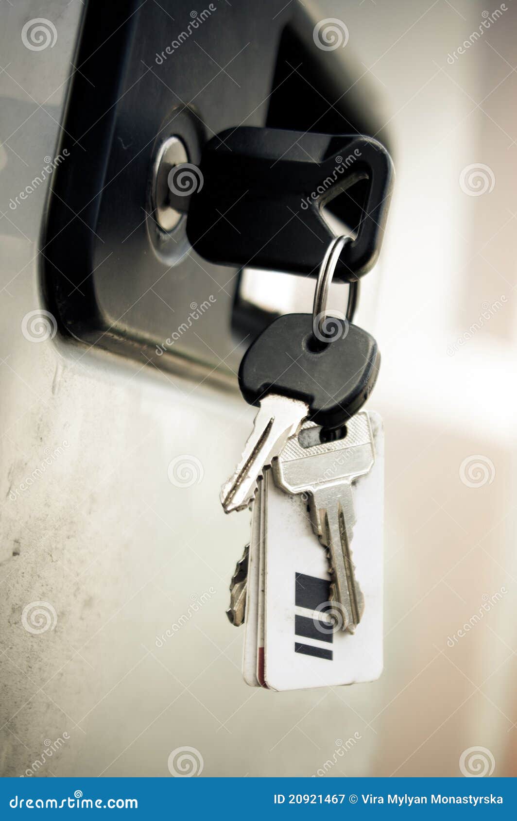 Keys into the lock of car stock image. Image of security 20921467