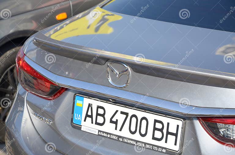 KHARKOV UKRAINE OCTOBER 21 2019: the Mazda Symbol on Cars Back Part KHARKOV UKRAINE OCTOBER 21 2019: the Mazda Symbol on Cars Back Part