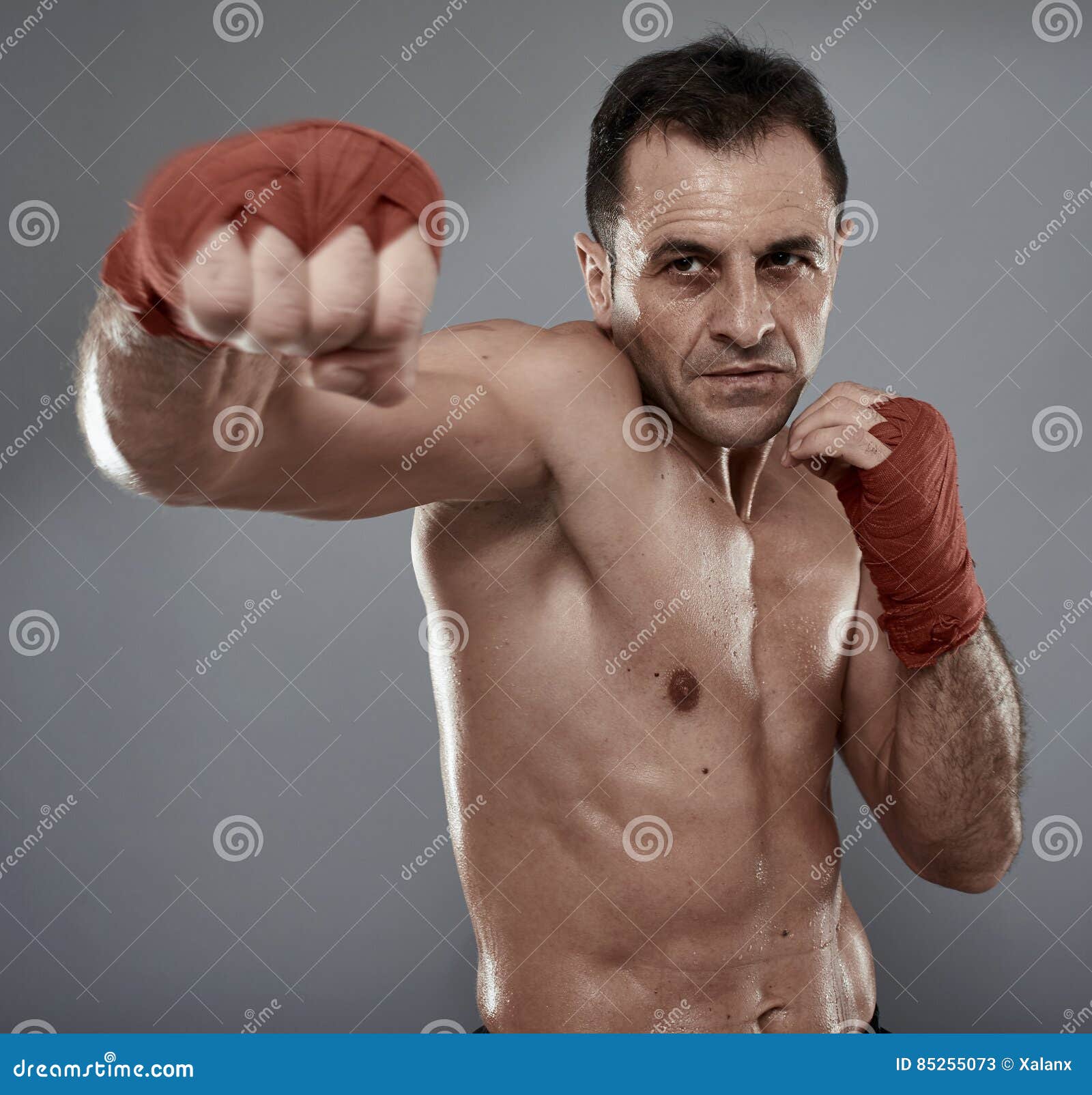 kickbox fighter on gray background