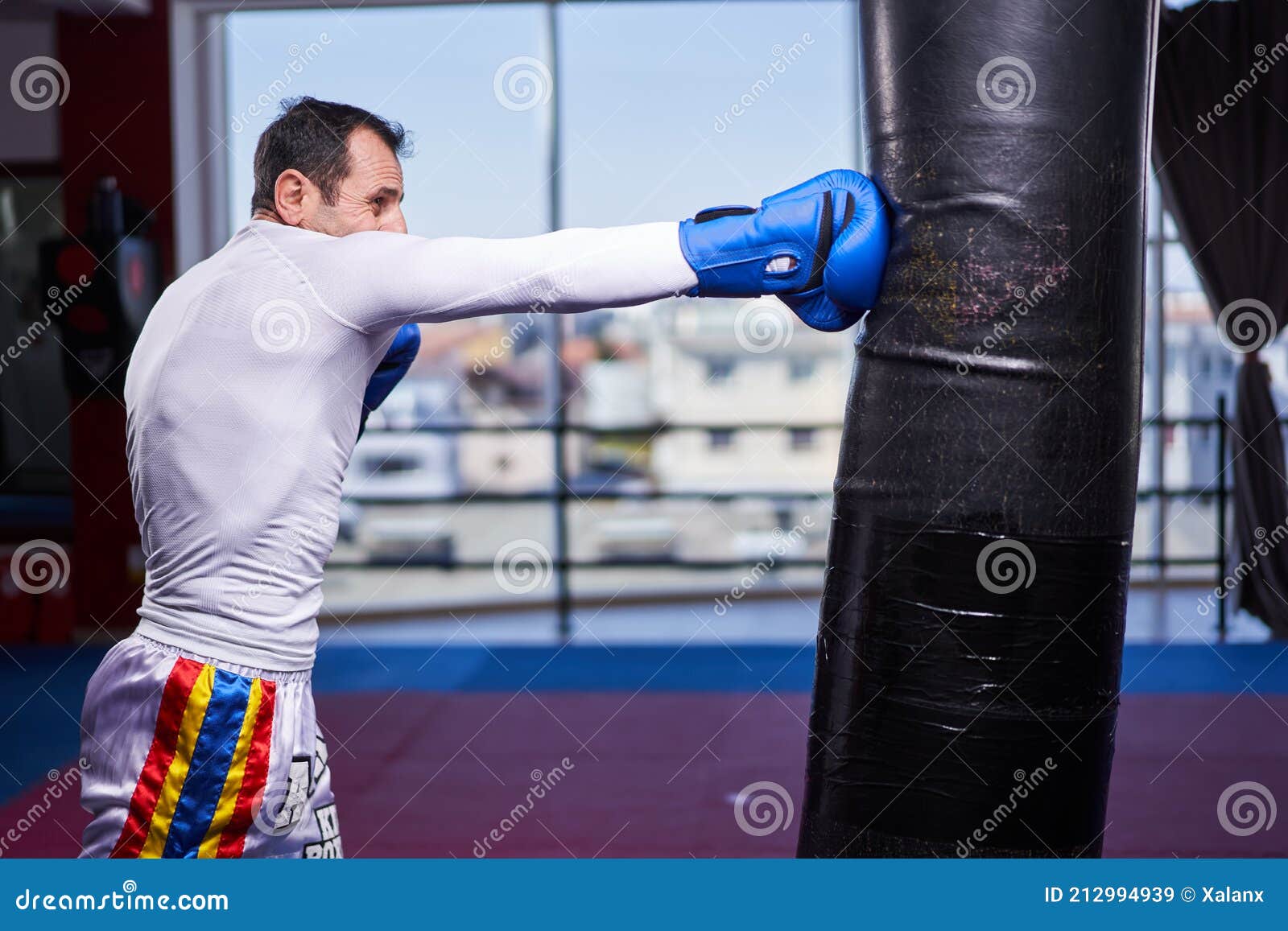 Kickboxer Hitting the Heavy Bag in the Gym Stock Image Image of boxer