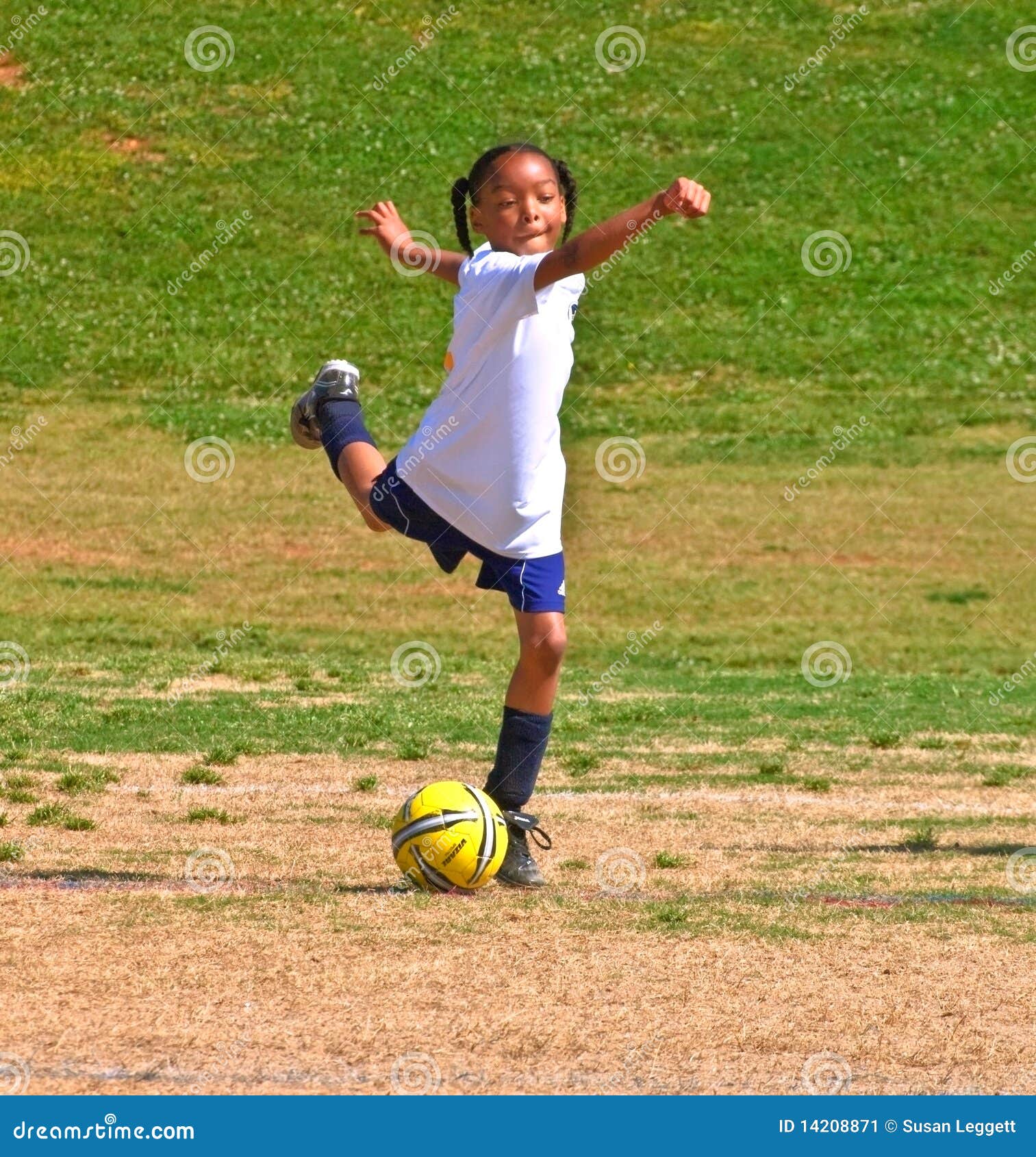 During the game, a soccer player kicked the ball