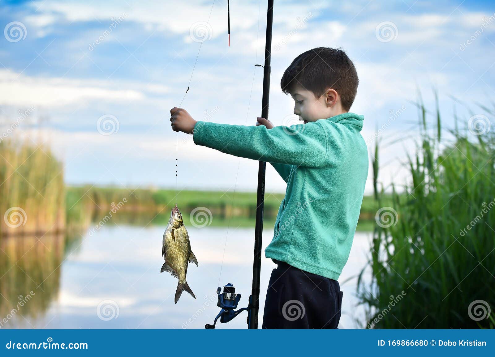 465 Boy Casting Fishing Rod Stock Photos - Free & Royalty-Free Stock Photos  from Dreamstime