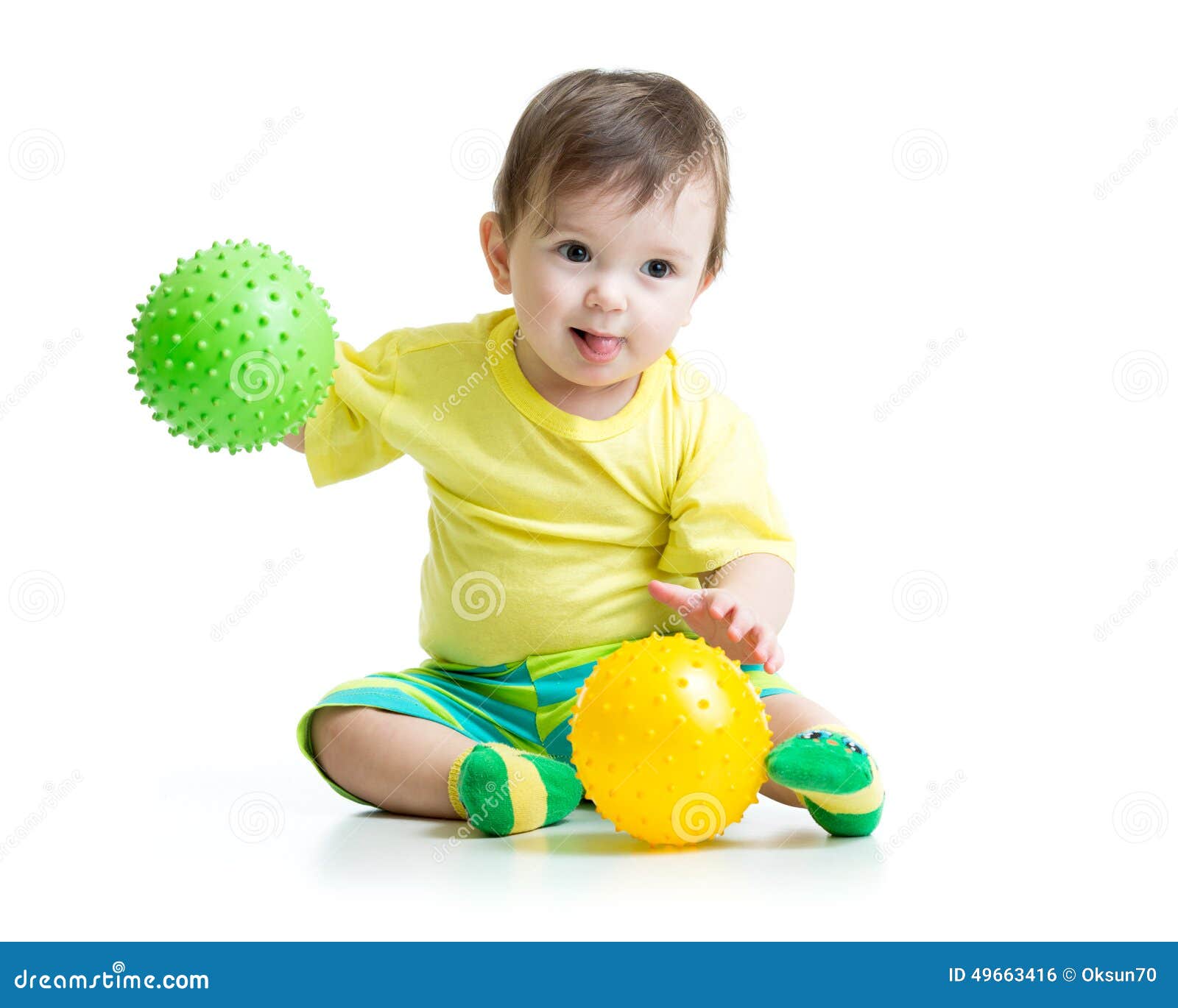 Kid boy with massage balls stock photo. Image of innocence 49663416