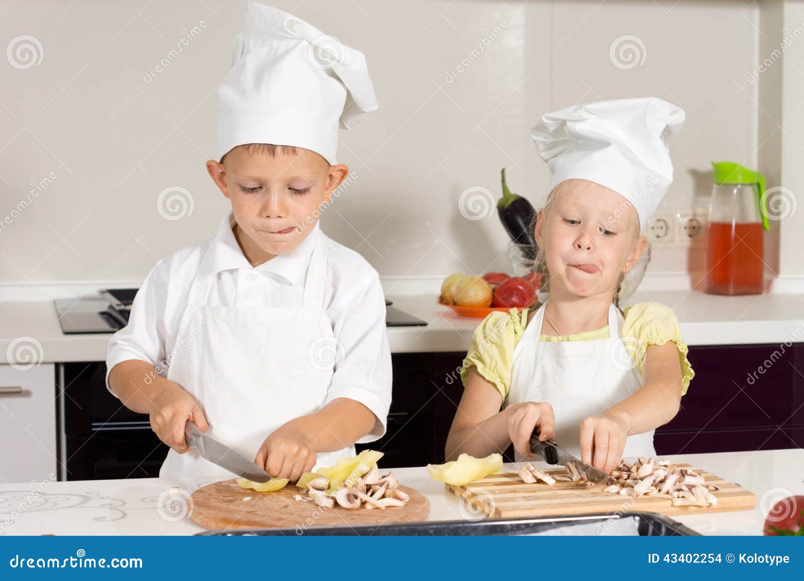 Kid Chefs Busy Slicing Ingredients at Kitchen Stock Photo Image of