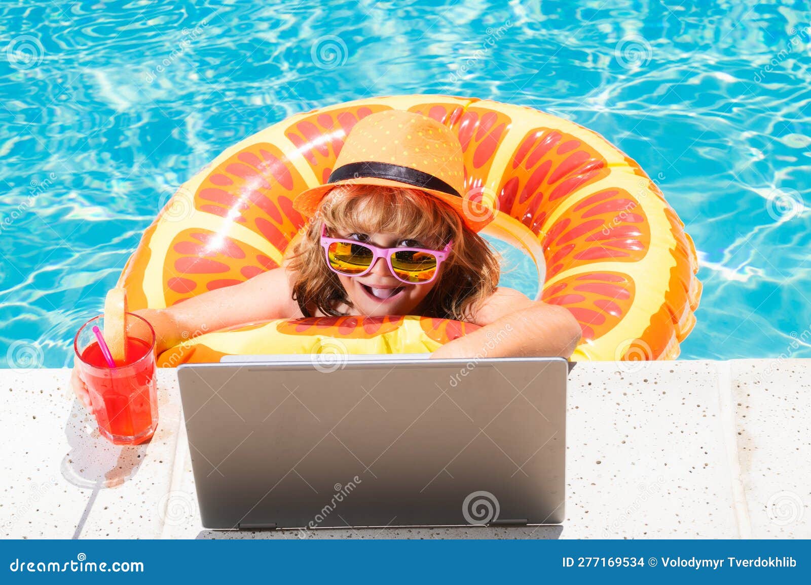 Kid Drink Summer Cocktail and Using Laptop in Swimming Pool