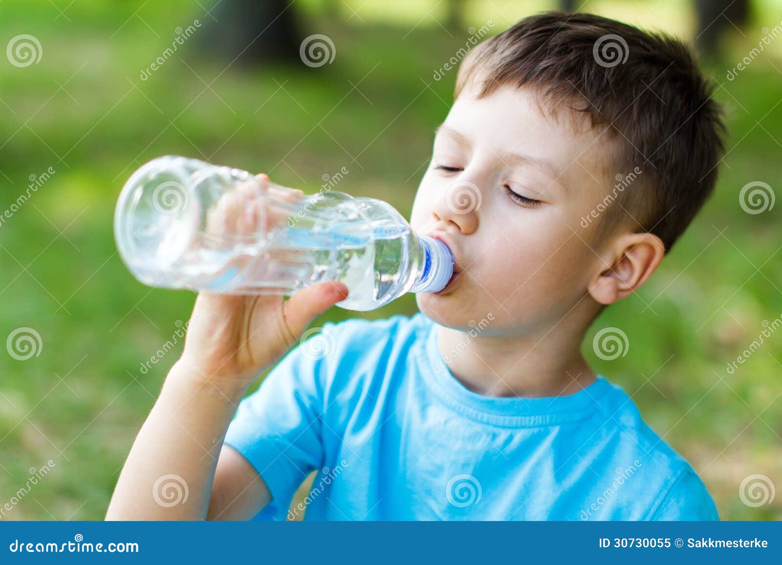 Kid drink water stock image. Image of lifestyle, hydrate 30730055