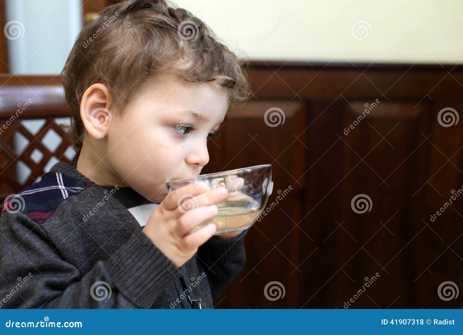 Kid drinking tea stock photo. Image of hand, horizontal 41907318