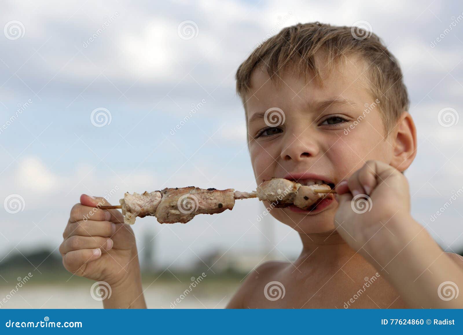Kid eating kebab stock photo. Image of meat, lifestyle 77624860