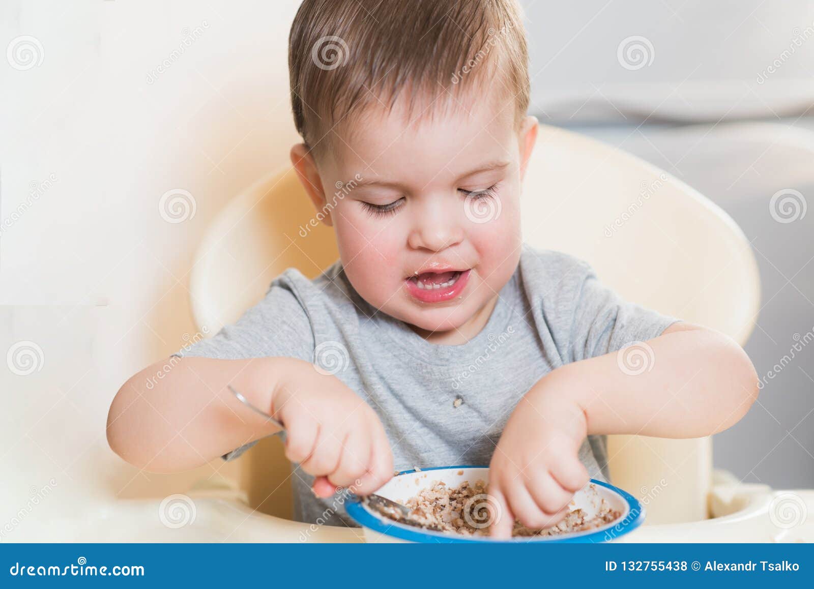 The Kid Eats Buckwheat Porridge in the Kitchen Stock Photo Image of