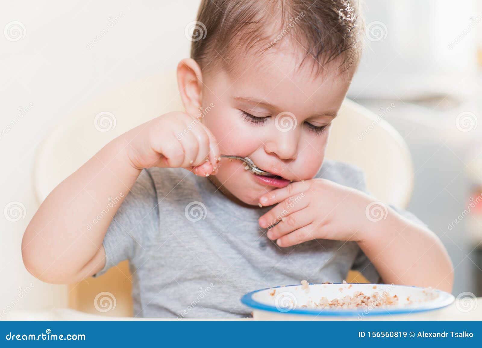 The Kid Eats Buckwheat Porridge in the Kitchen Stock Image Image of child, caucasian 156560819