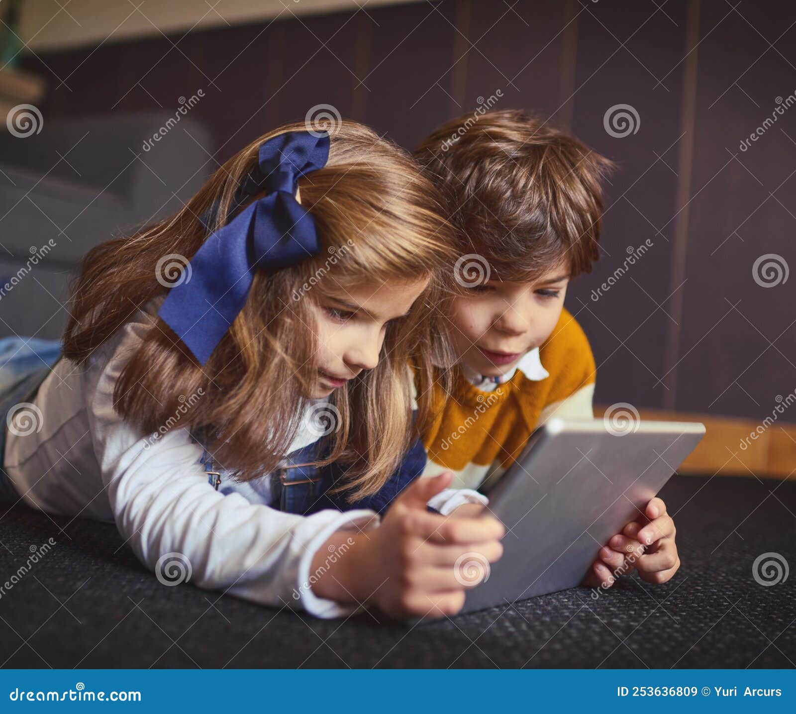Kidfriendly Apps are so Popular these Days. a Little Boy and Girl