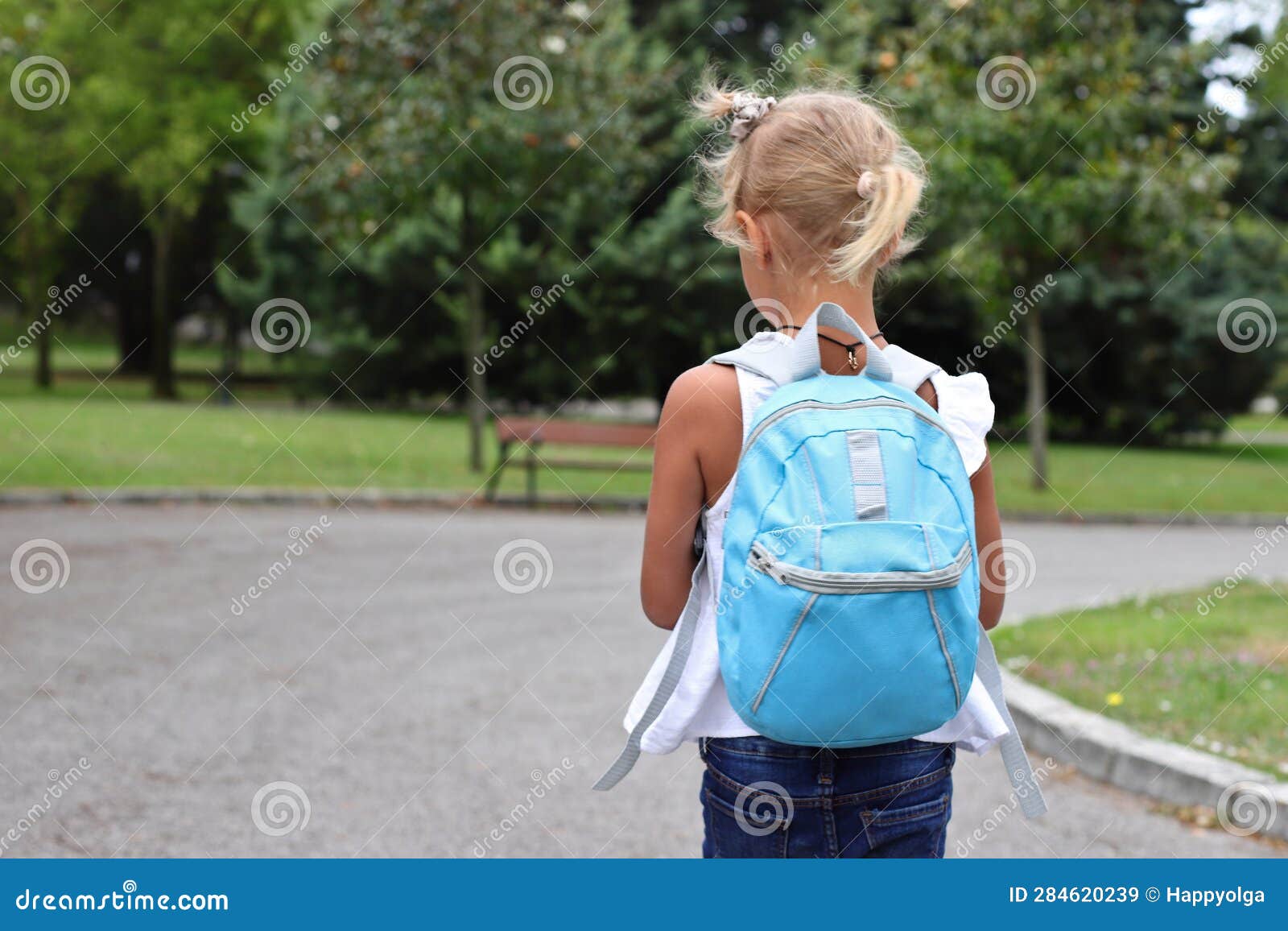Kid Girl with Blue Backpack Going To School, Lifestyle Staging Stock ...