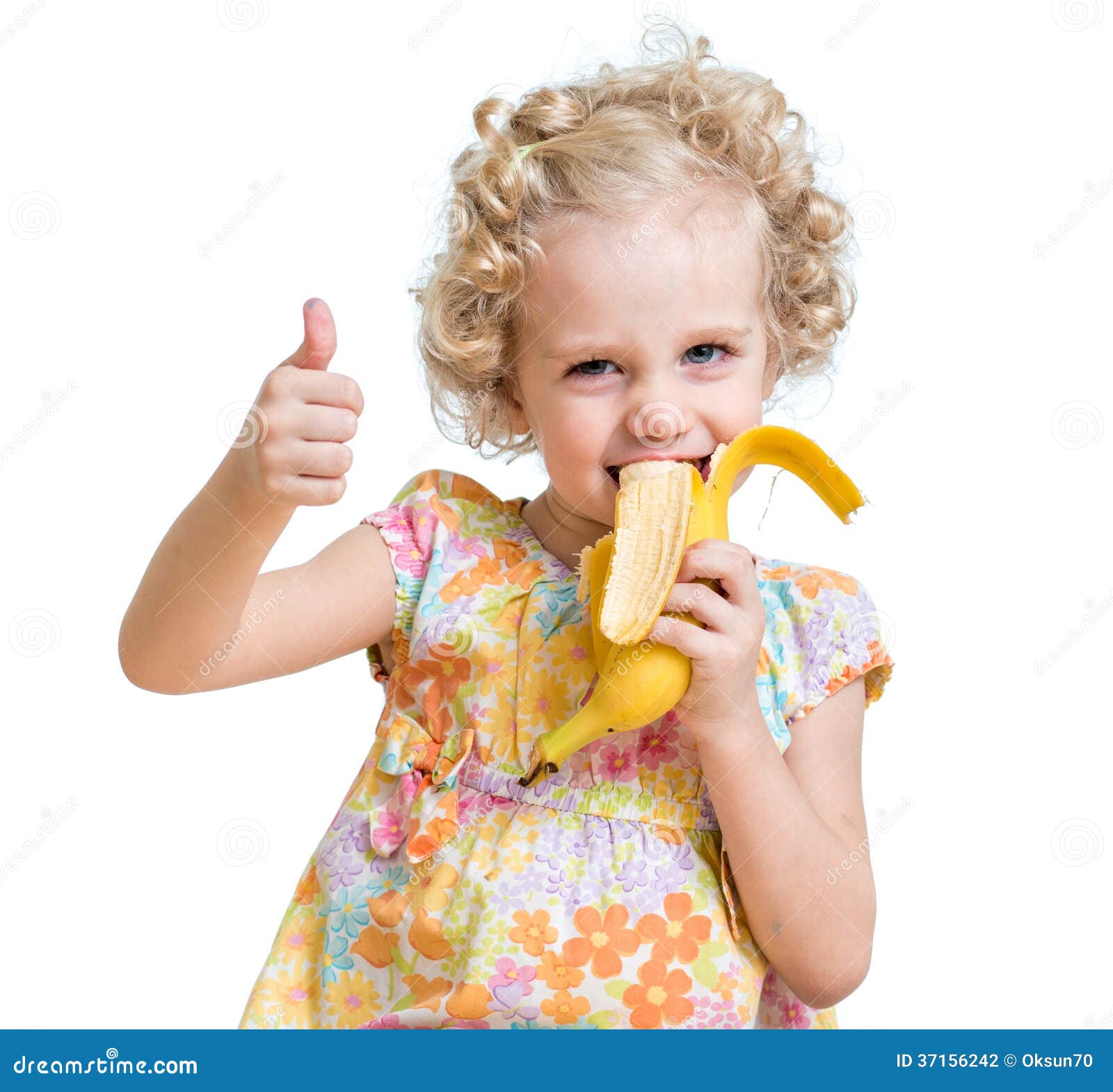 child eating banana