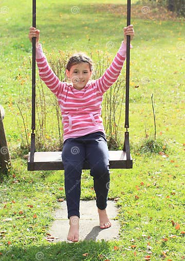 Kid - girl on swing stock photo. Image of barefeet, playing - 34750752