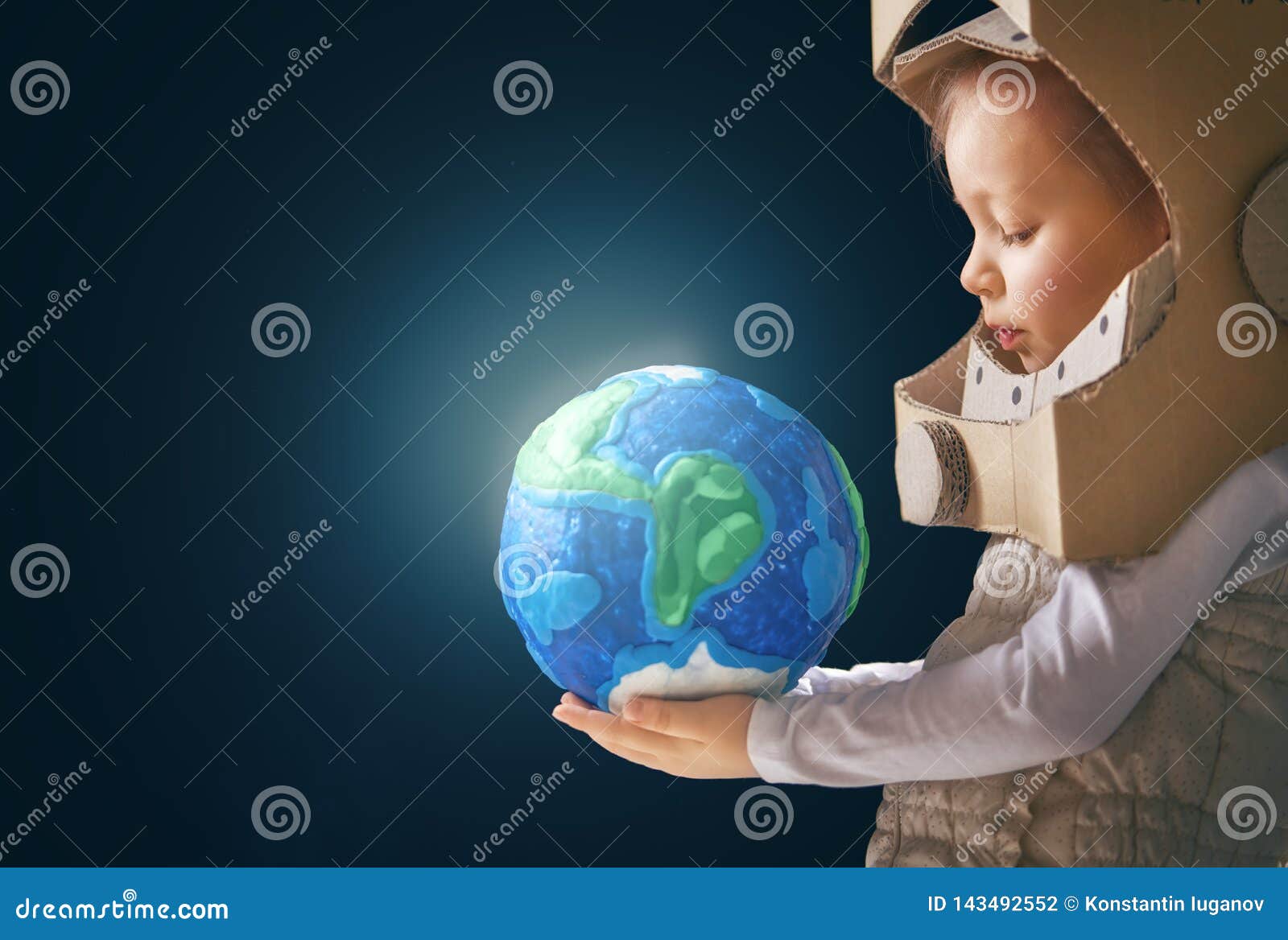 kid with globe