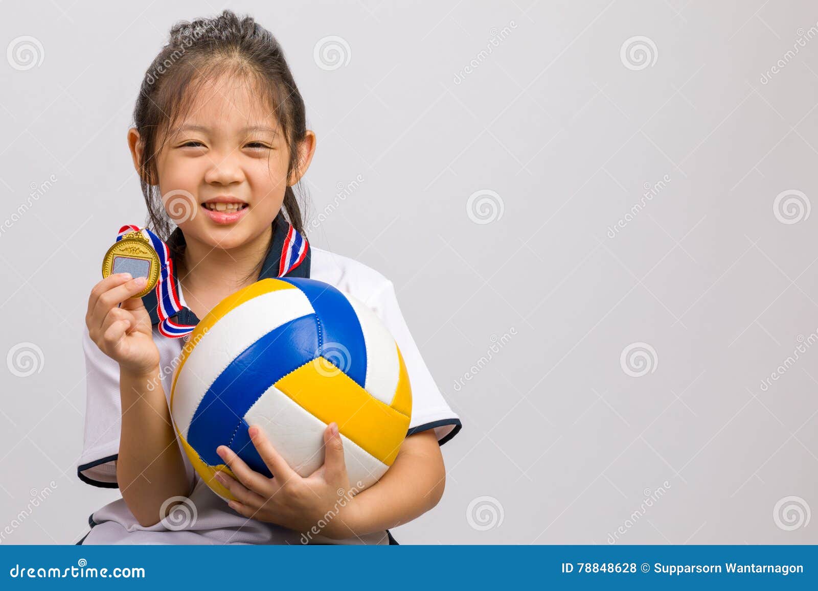 Kid Holding Ball and Gold Medal, Isolated on White Stock Photo - Image ...