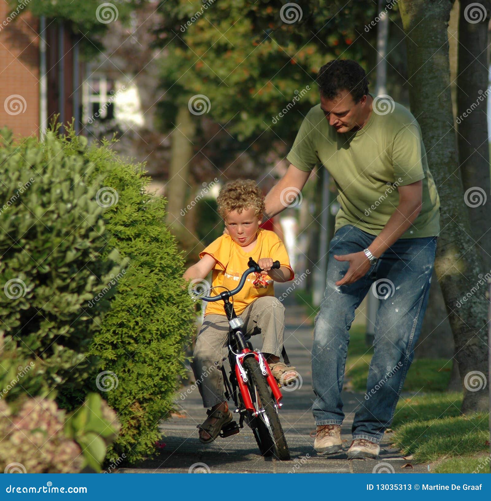 kid learning biking