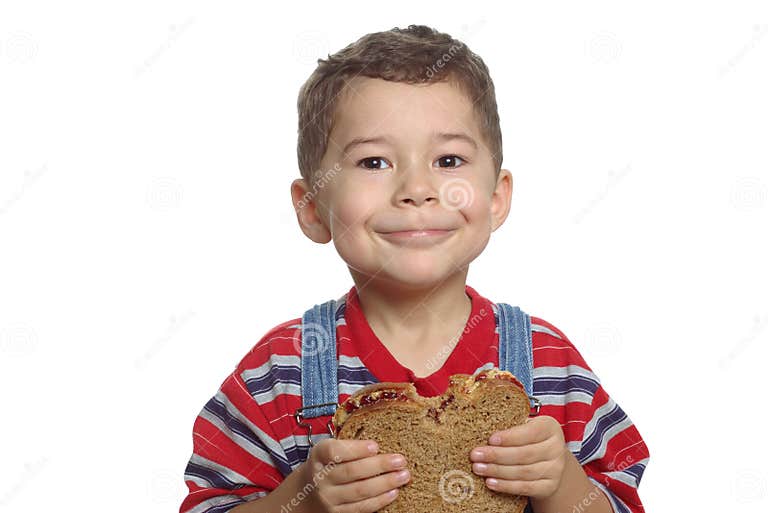 Kid and peanut butter stock photo. Image of handsome, butter 1594882
