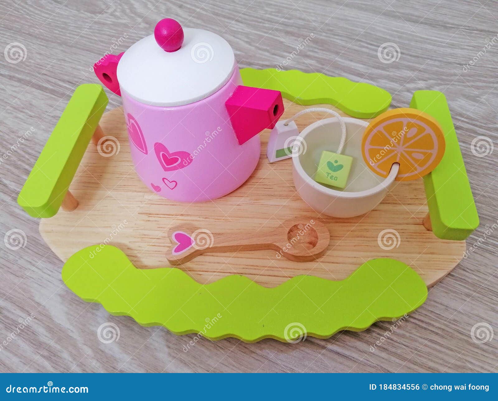 Kid play wooden teapot set stock photo. Image of motorskill 184834556
