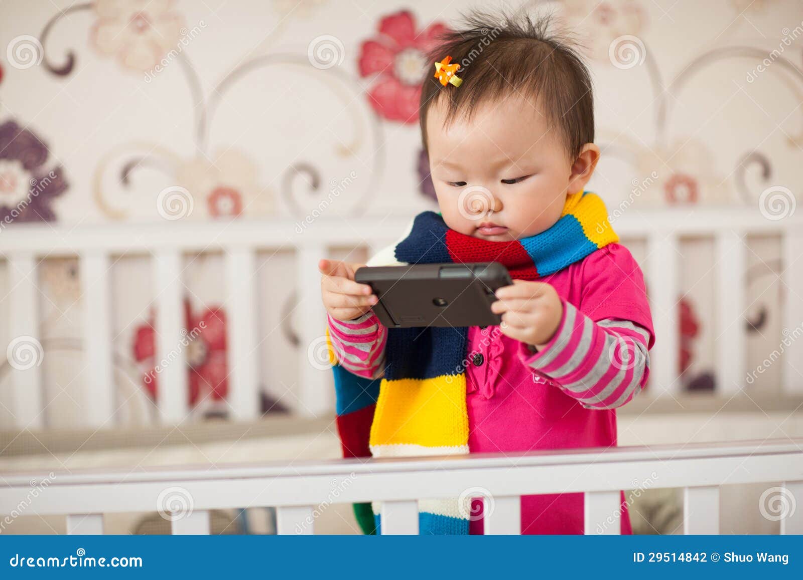 kid playing cellphone