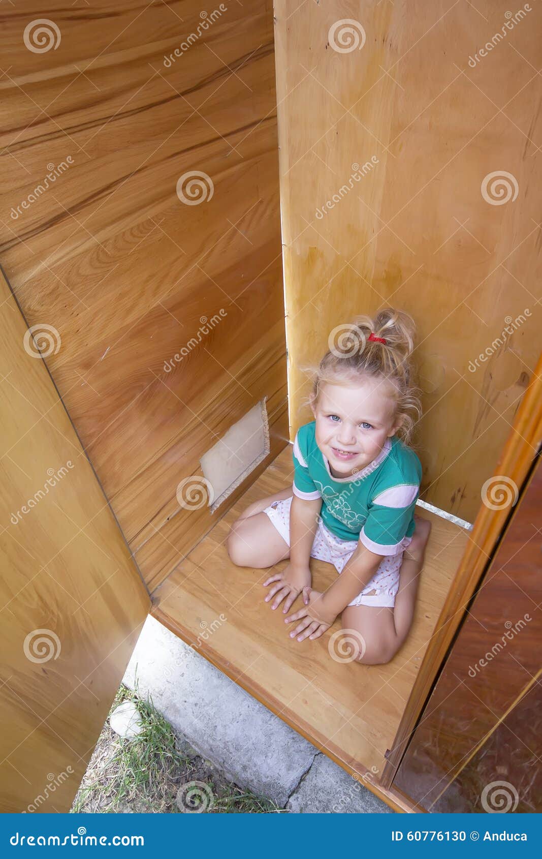 kid playing in old wardrobe