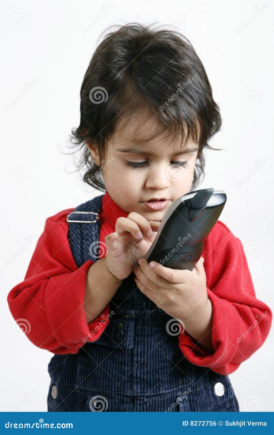 Kid playing with phone stock photo. Image of dialing, children 8272756