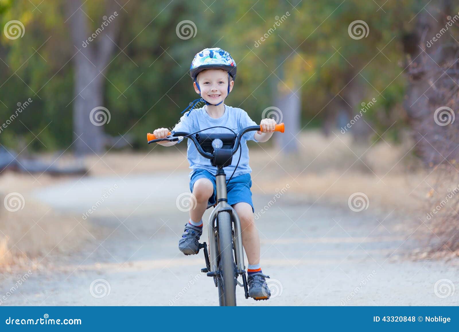 little kid riding bike