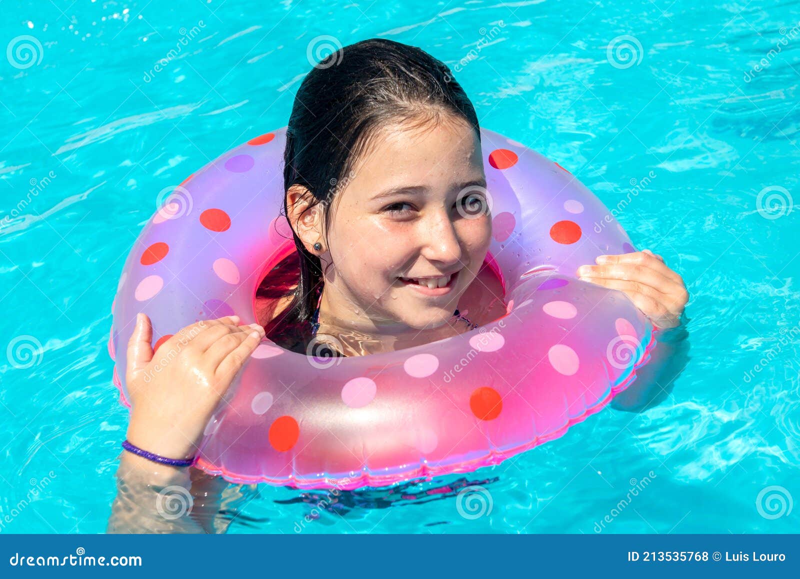 Kid in a swimming pool stock photo. Image of vacations - 213535768