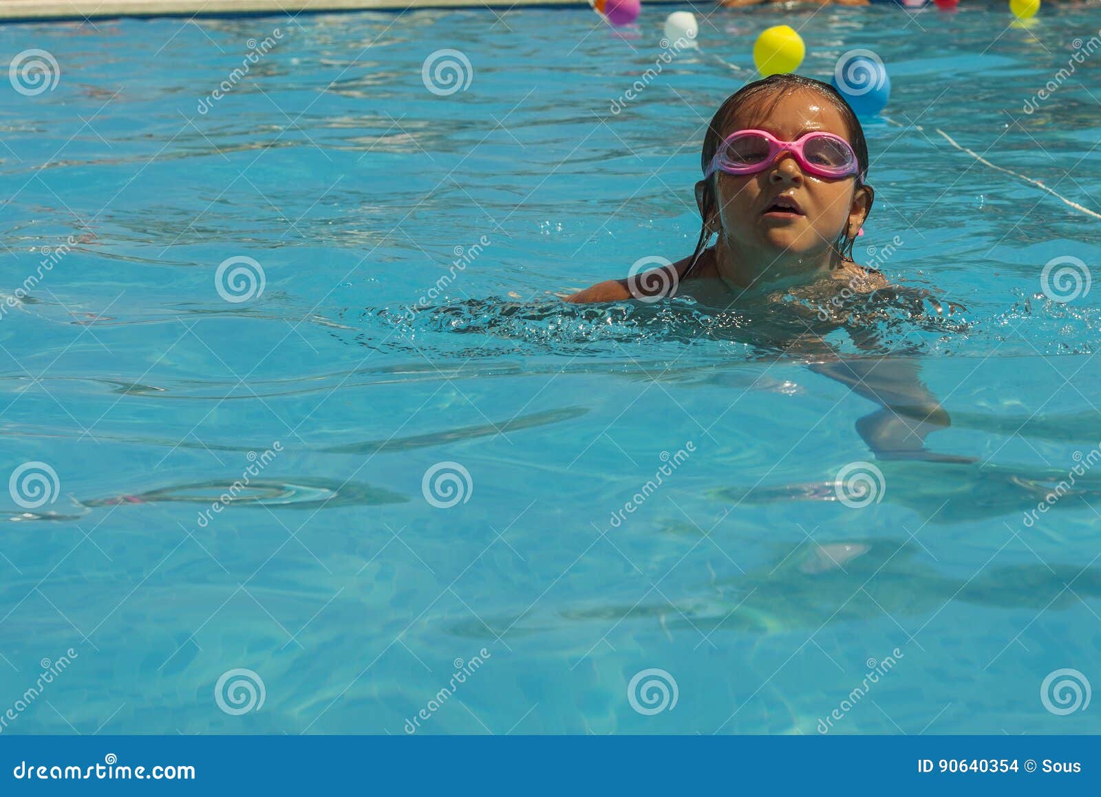 Kid Wearing Goggles Swimming in the Pool. Stock Photo Image of enjoy
