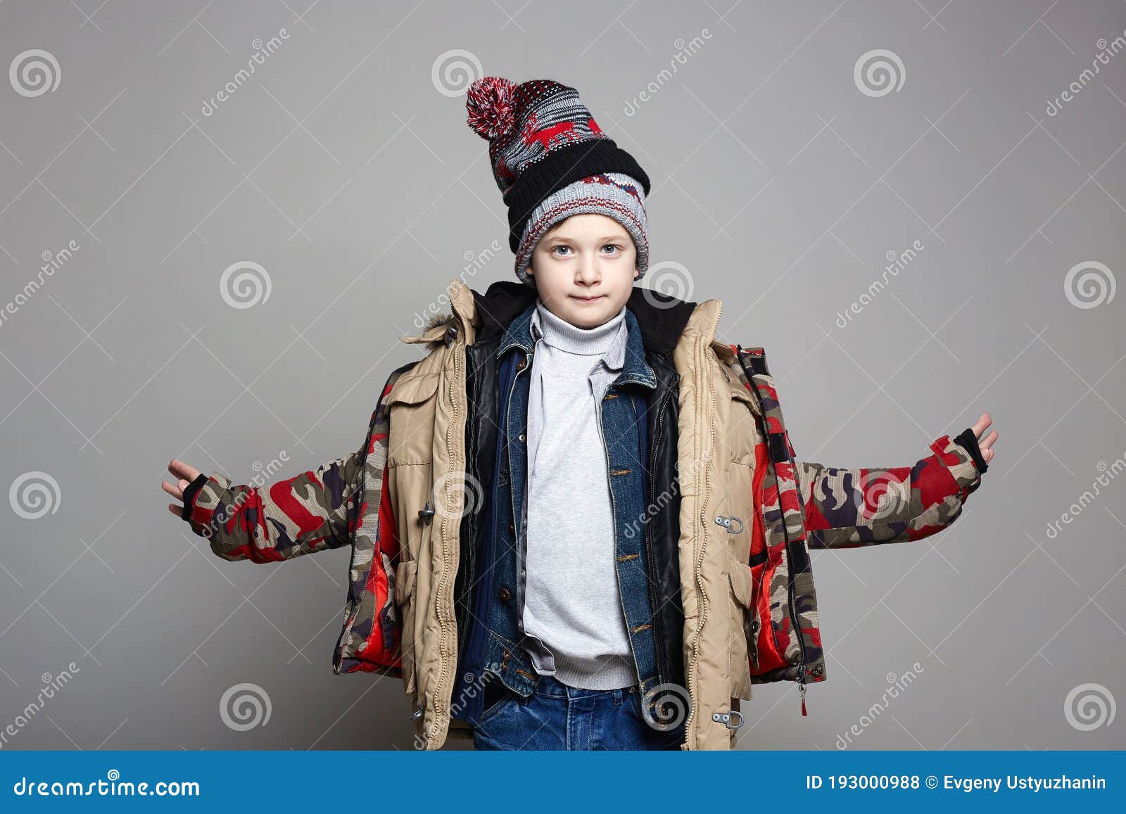 Kid Wore All His Clothes. Funny Boy in Winter Outerwear Stock ...
