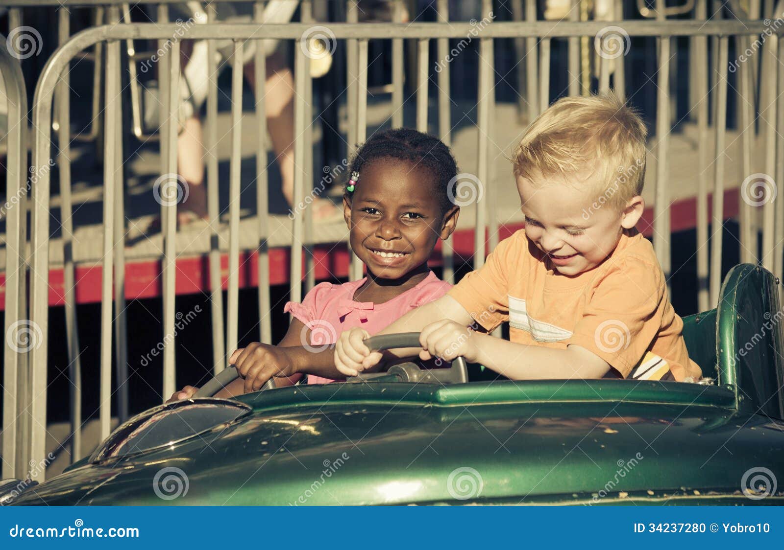 kids on an amusement park ride