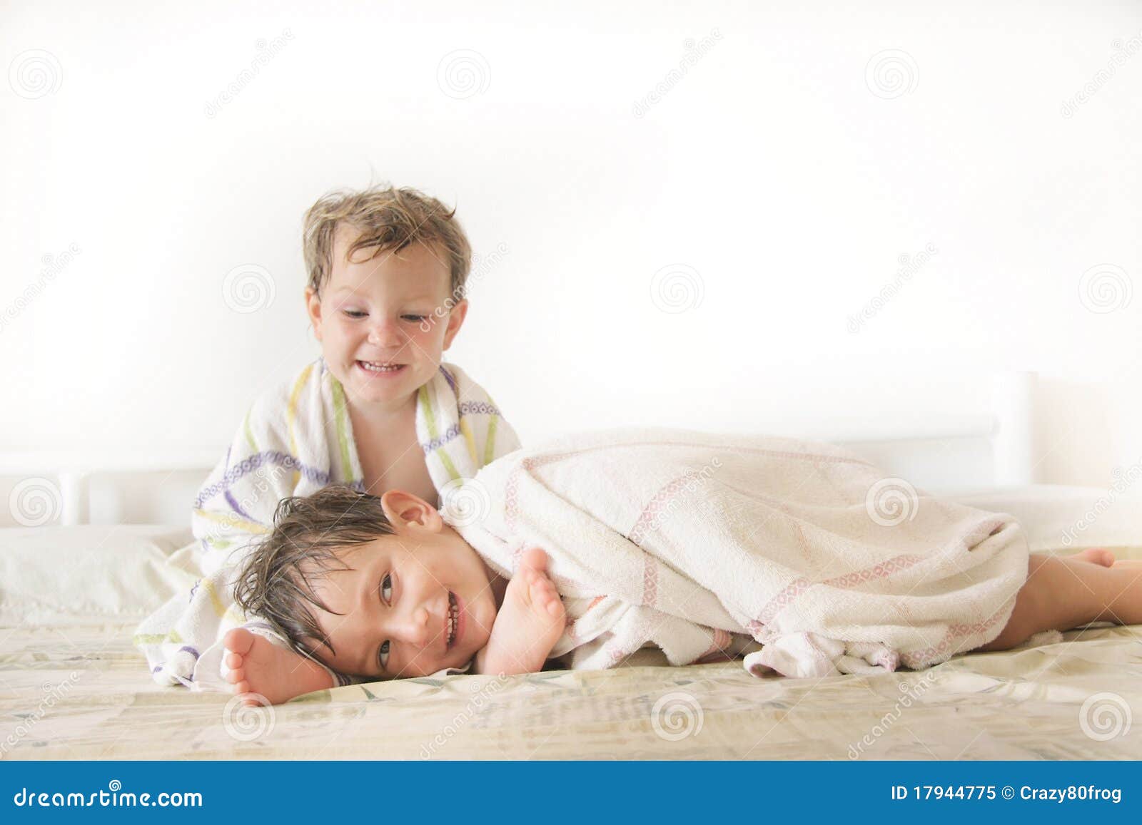 Kids in bed after shower stock image. Image of beautiful 17944775