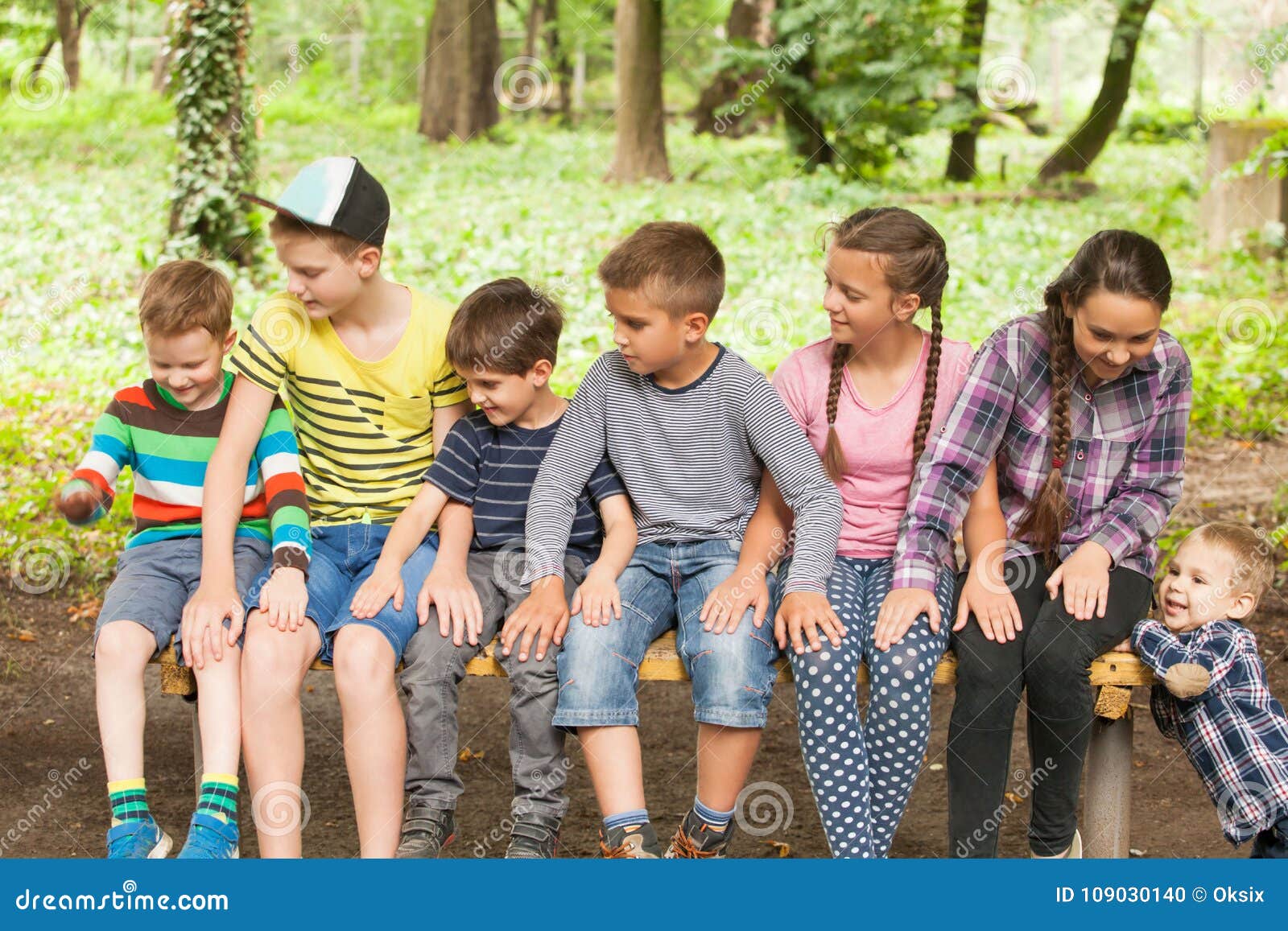 Kids on the bench stock photo. Image of friend, girl 109030140