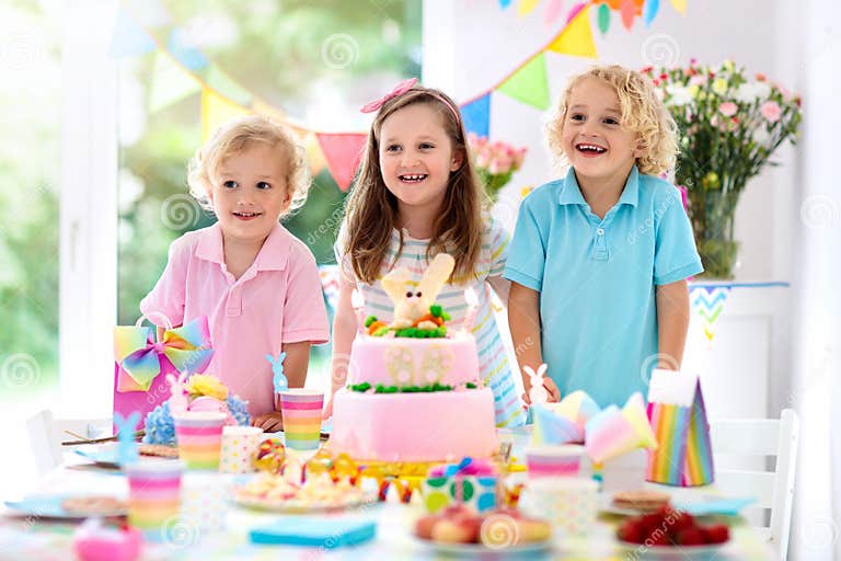 Kids Birthday Party. Children Blow Cake Candles Stock Photo - Image of ...