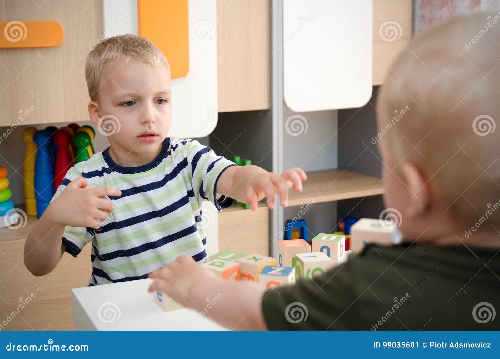 Kids Boys Playing With Toy Blocks At Home Or Kindergarten Stock Image