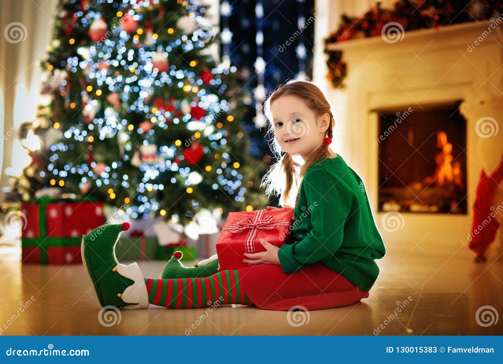 children opening presents