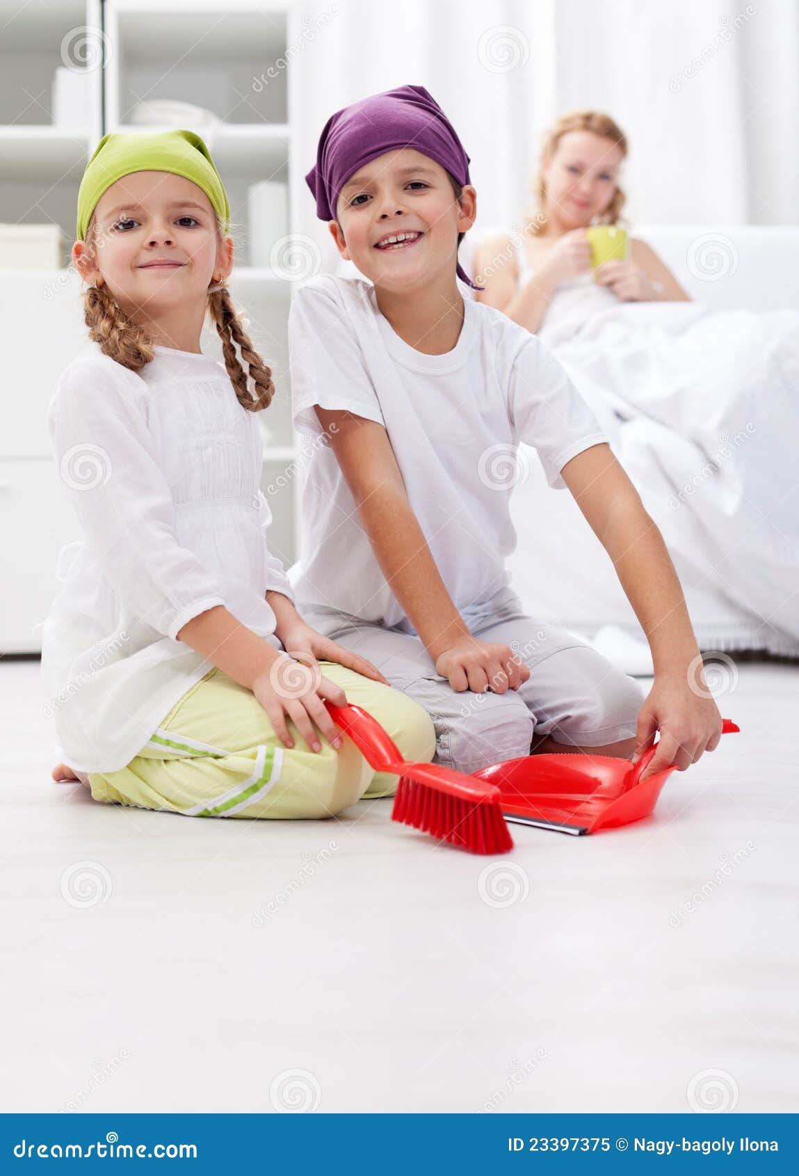 Kids Cleaning The Room Helping Their Mother Royalty Free Stock Photo