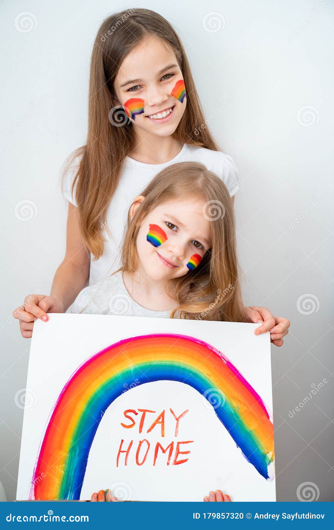 kids drew rainbow and poster stay home.