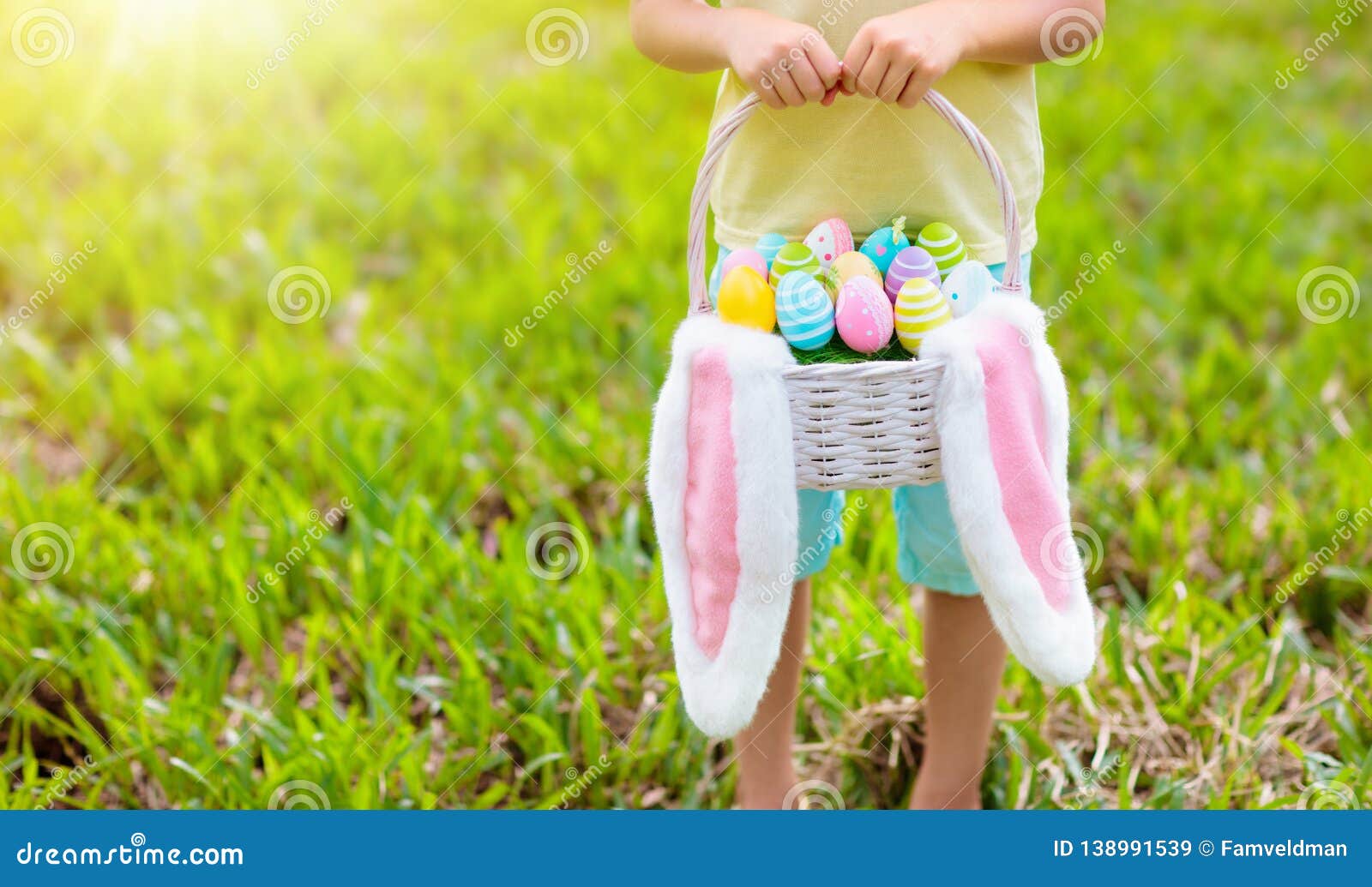 kids with eggs basket on easter egg hunt