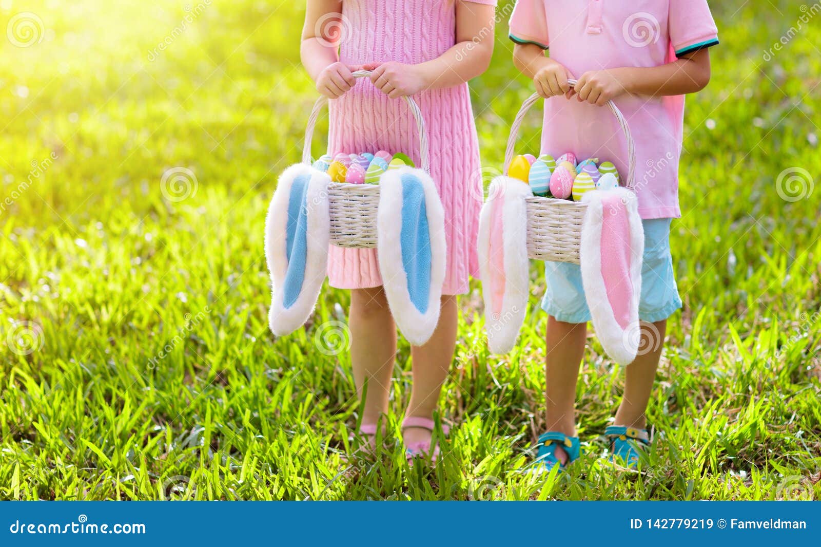 kids with eggs basket on easter egg hunt