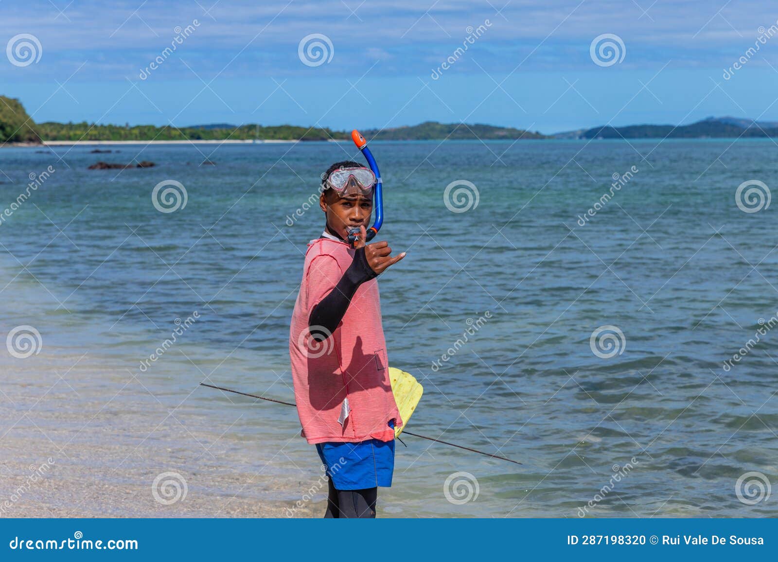 Kids fishing at the beach editorial image. Image of young - 287198320