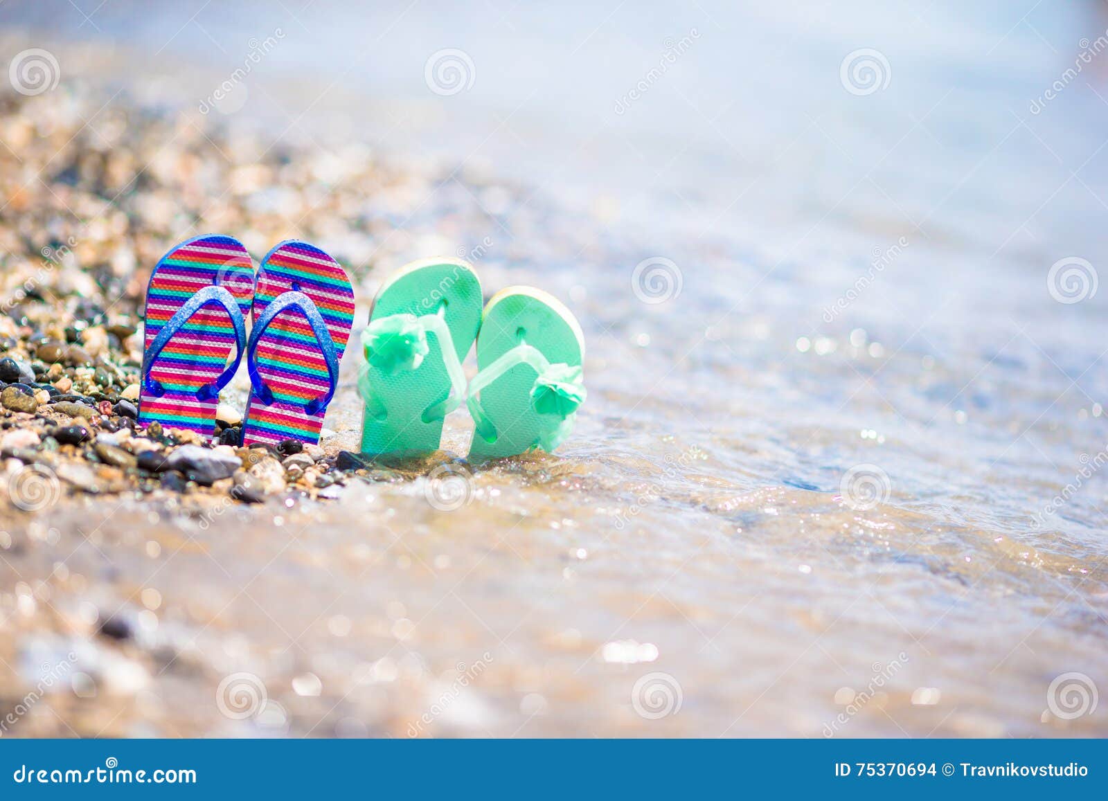 Kids Flip Flops on Beach in Front of the Sea Stock Photo - Image of