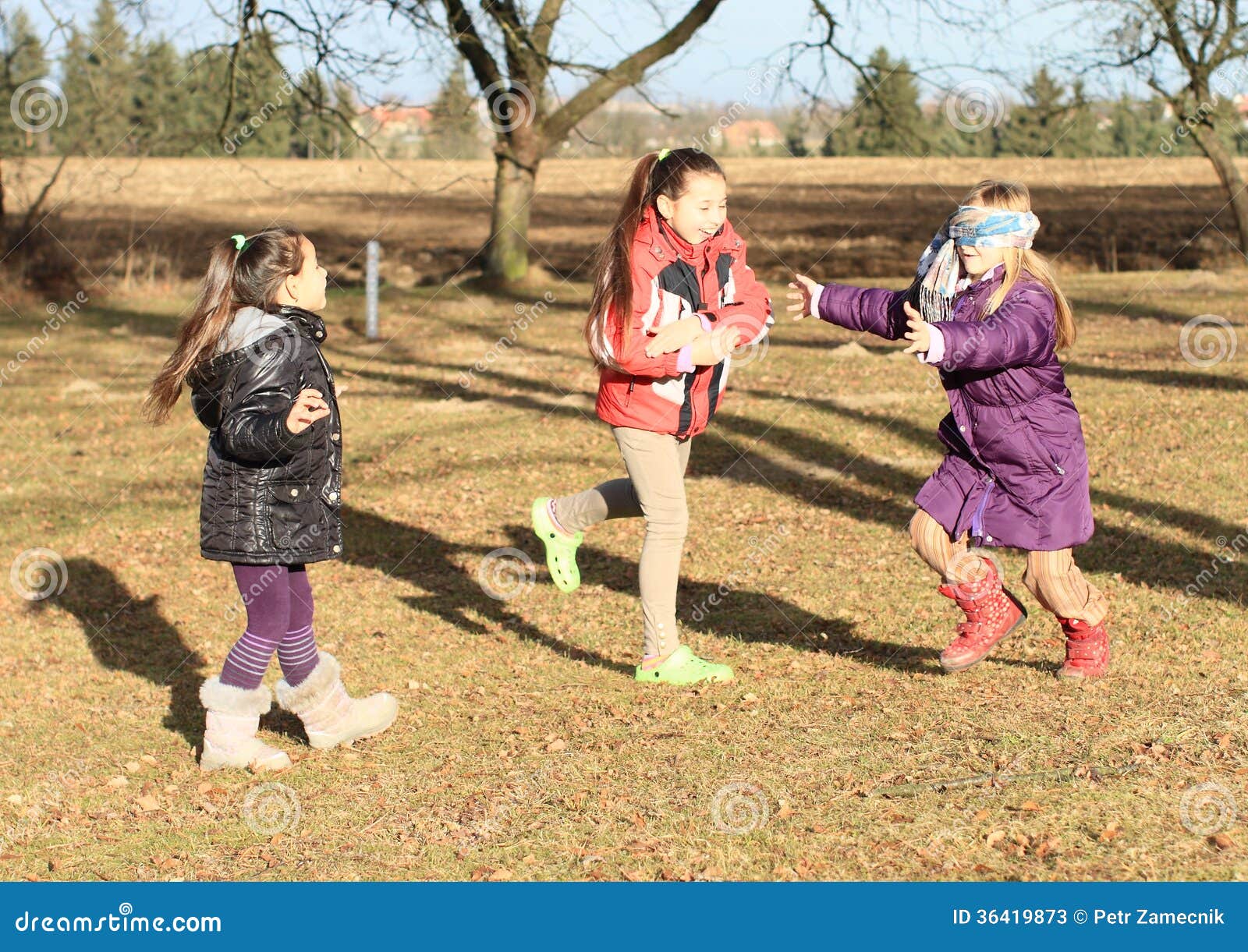 kids - girls playing blind man's buff