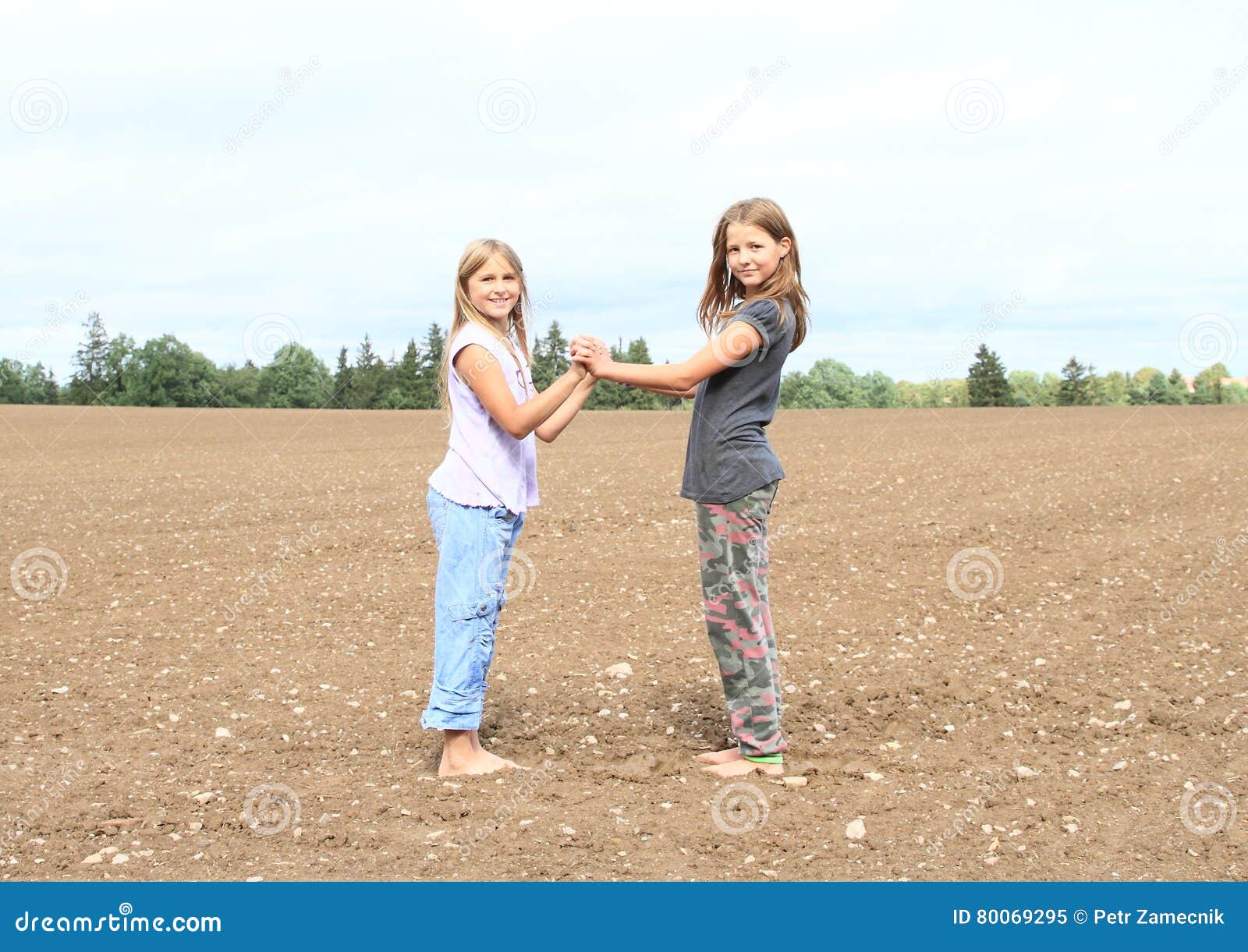 https://thumbs.dreamstime.com/z/kids-girls-standing-field-little-barefoot-ground-muddy-80069295.jpg