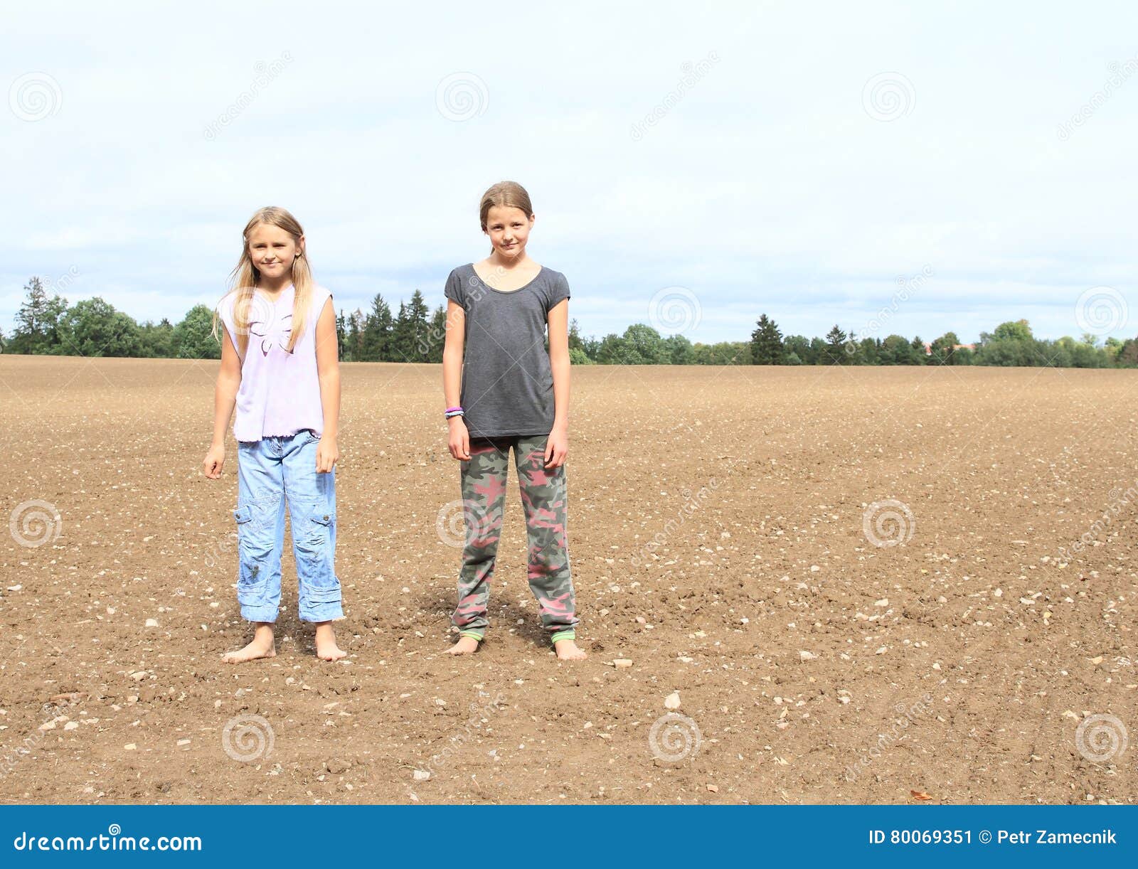 https://thumbs.dreamstime.com/z/kids-girls-standing-field-little-barefoot-ground-muddy-80069351.jpg