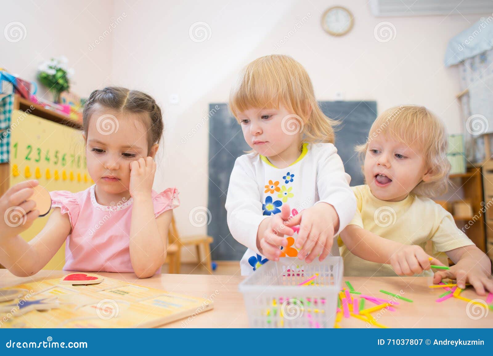 Little pre-school girl learns to solve puzzles online and plays educational  games on tablet at home - a Royalty Free Stock Photo from Photocase