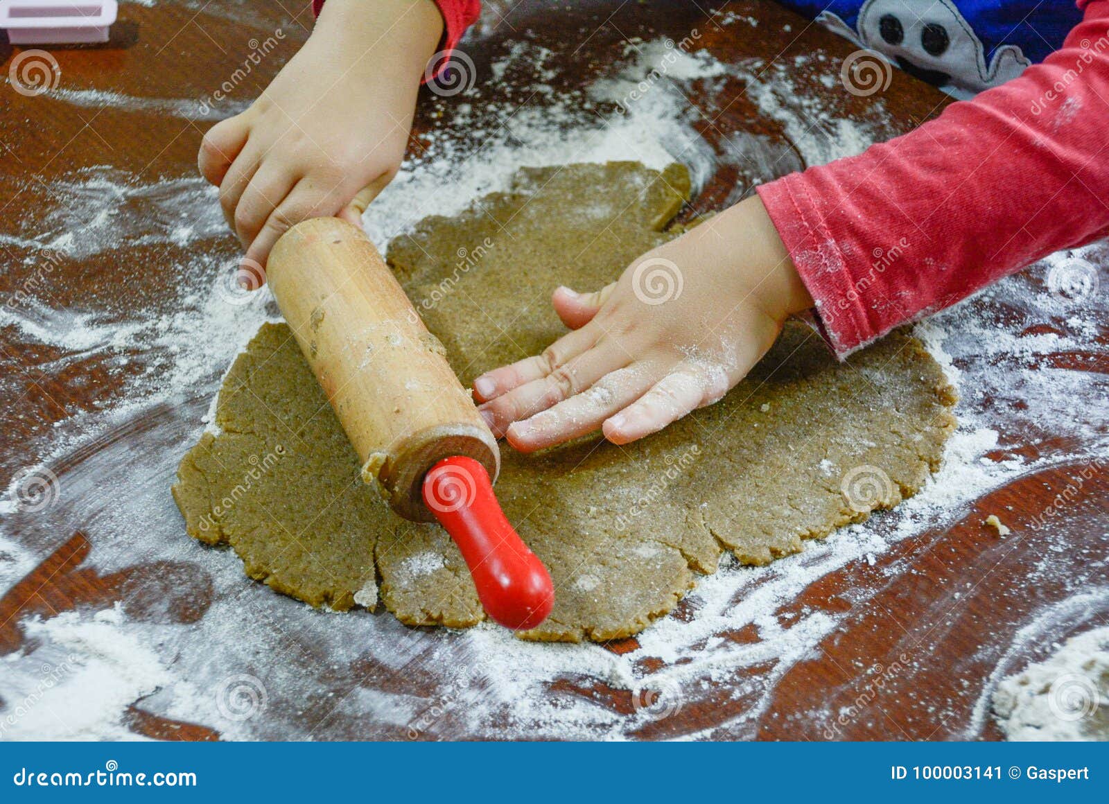 Kids hands making biscuits stock image. Image of flour 100003141
