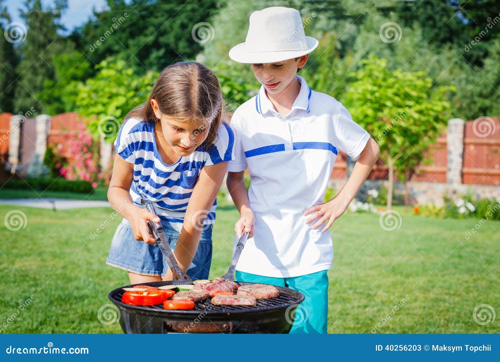 Kids Having a Barbecue Party Stock Image Image of dinner, barbecue
