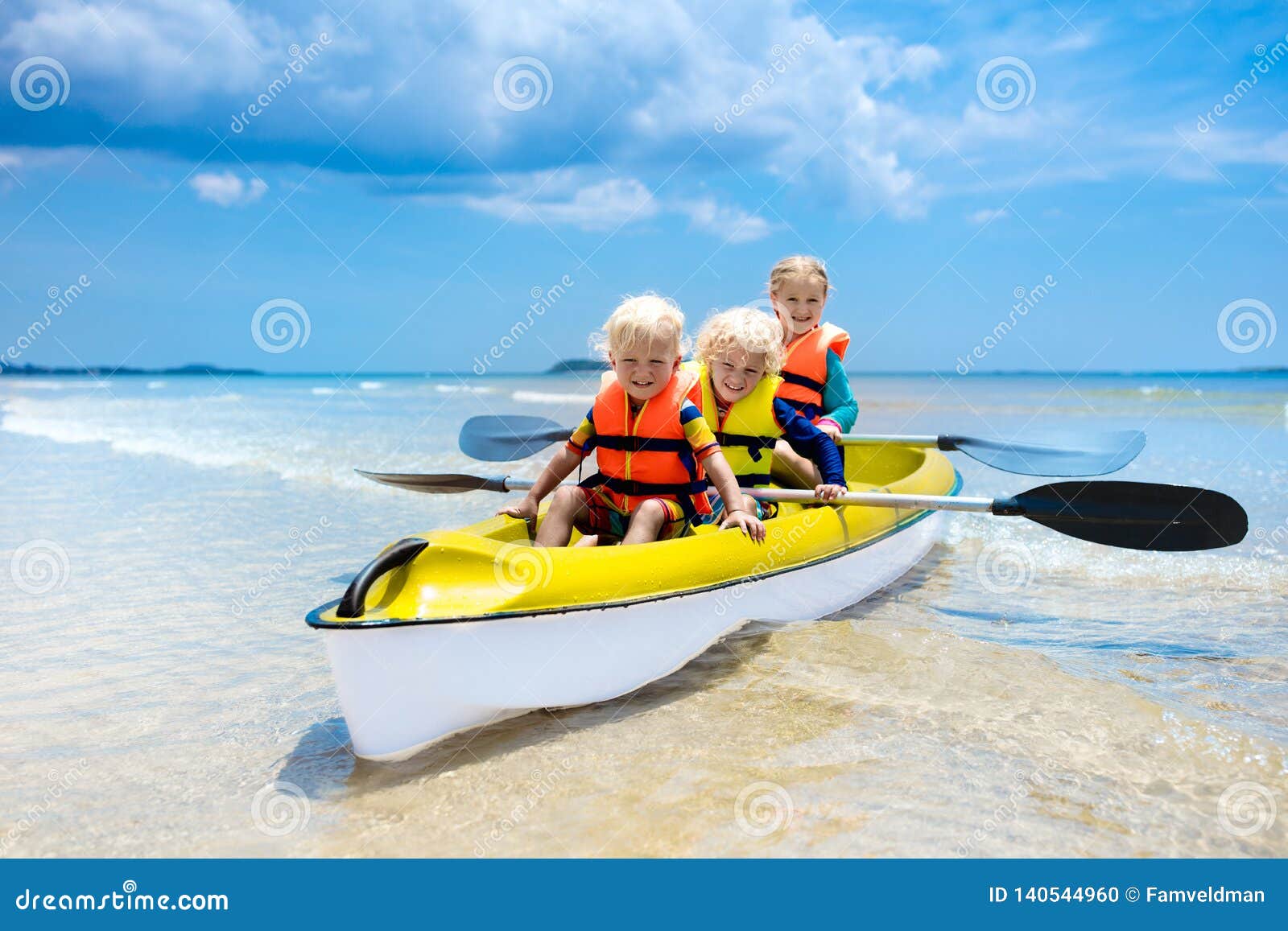 Kids Kayaking In Ocean. Children In Kayak In Tropical Sea ... Kids Kayaking In Ocean. Children In Kayak In Tropical Sea ...