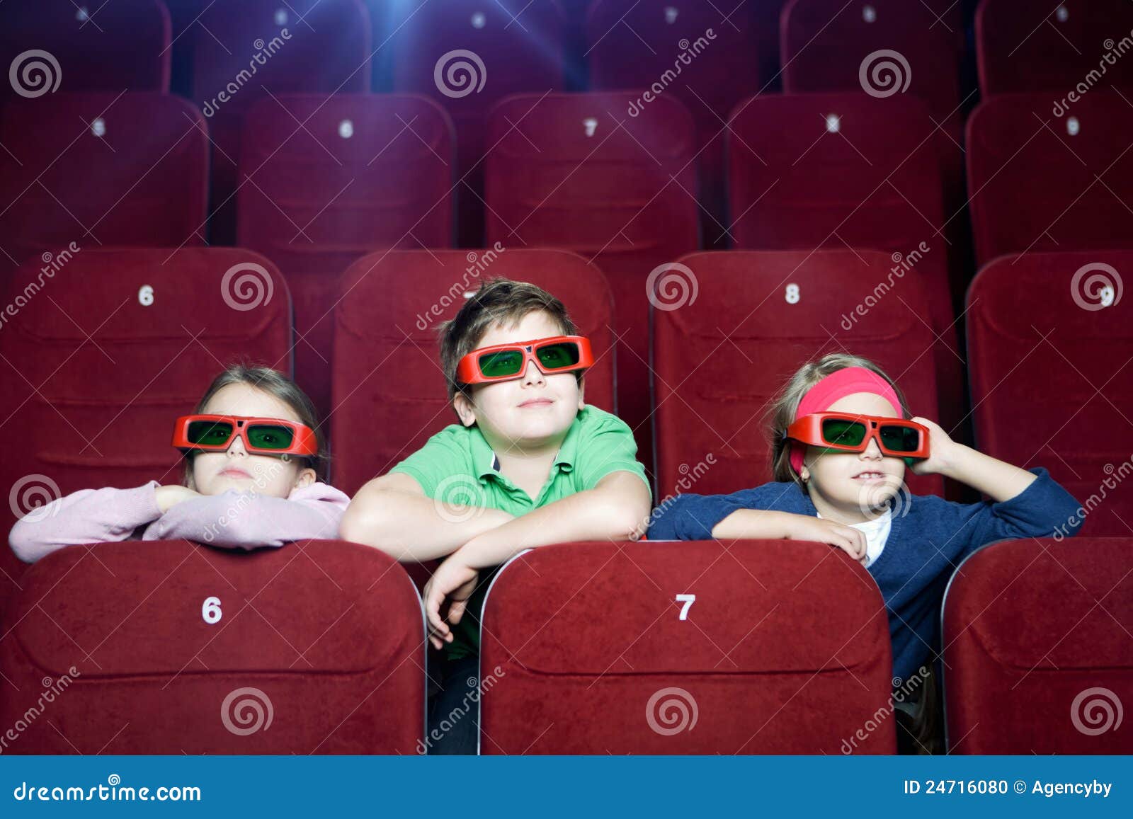 Kids in the movie theater stock photo. Image of friends 24716080